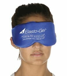 Woman experiencing relief with TheraLife's warm compress for eyes